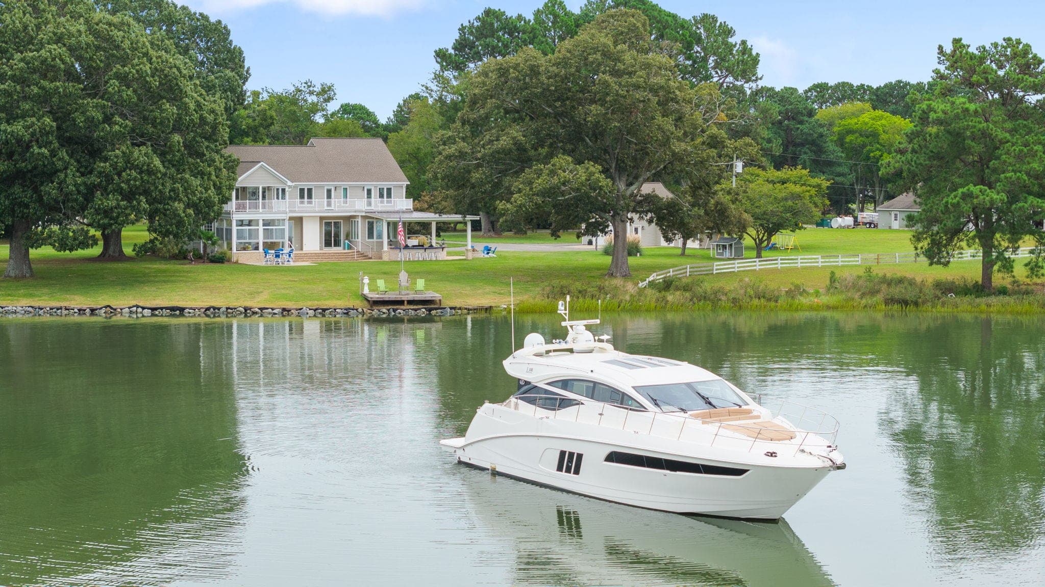 Little England — A deep-water estate on 2.15 acres where Sarah's Creek meets the York River, with water views from every room.